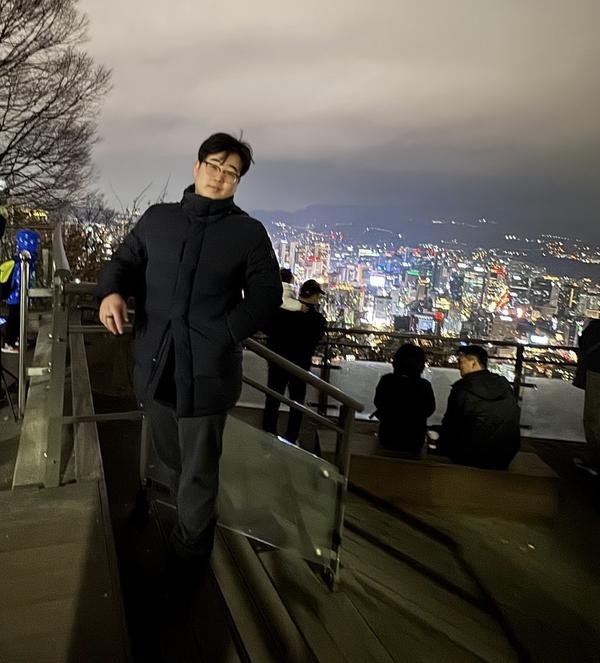 Johnny overlooking Seoul at night